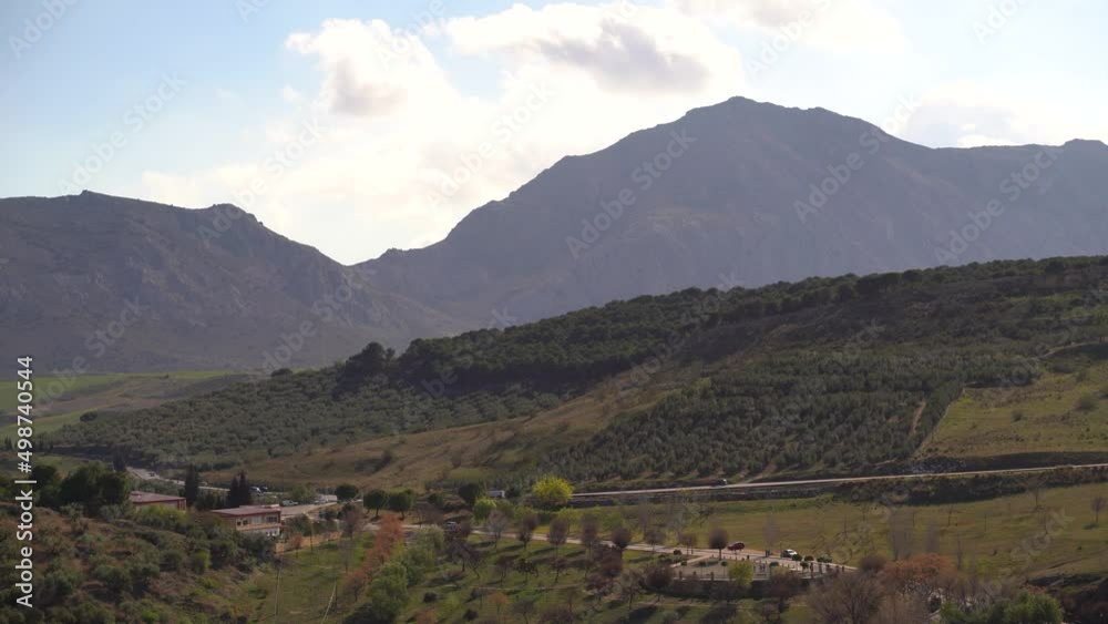Beautiful view out on Spanish countryside with hills, mountains and rural road Beautiful view out on Spanish countryside with hills, mountains and rural road