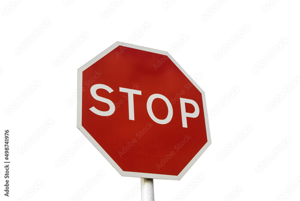 Red stop sign against a white background. Red stop sign against a white background.