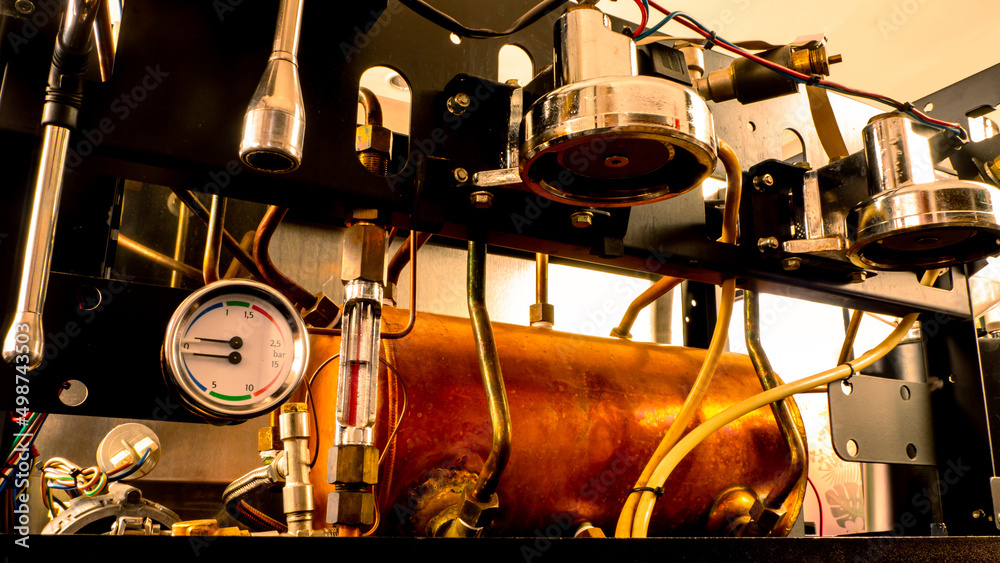 Naklejka premium Inside coffee machine of espresso machine. Repairing of broken coffee machine.