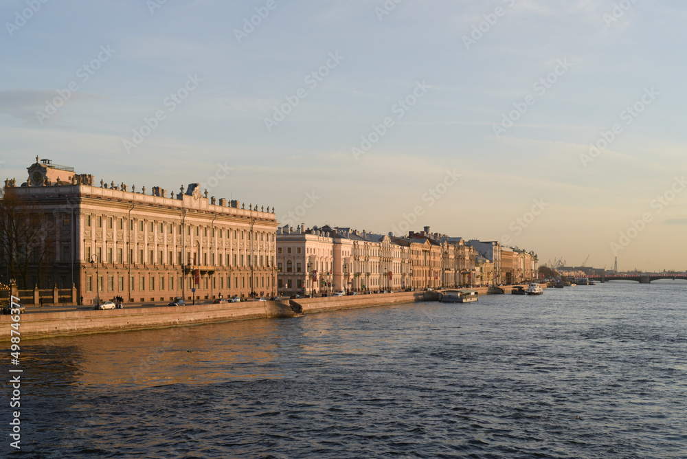 Sunset in St. Petersburg. Beautiful houses along the river. Summer city.