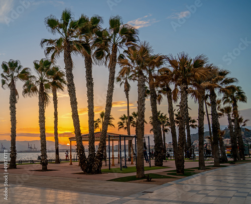 Setting sun at the esplanade near Malaga, Spain  © Gert-Jan van Vliet