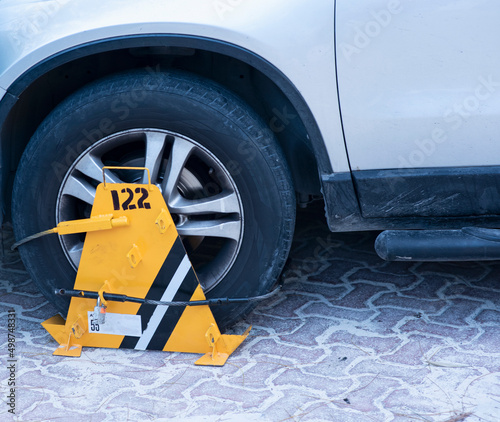 A Locked wheel of a car parked in an improper place in Playa del Carmen, Mexico