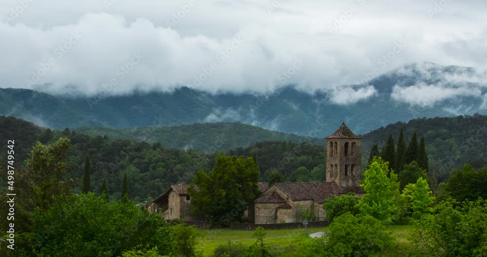 Time lapse scene of spring in Sant Marti De Capsec church, La Garrotxa, Spain Time lapse scene of spring in Sant Marti De Capsec church, La Garrotxa, Spain