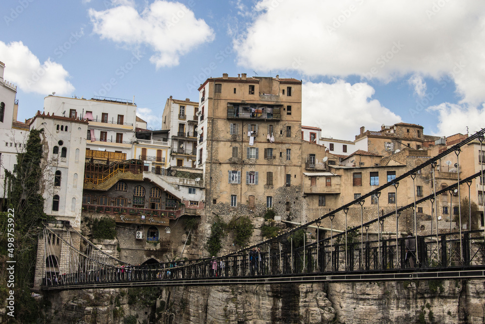 View of suspended bridge with old houses on the background, Constantine, Algeria