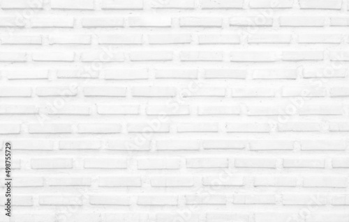 White grunge brick wall texture background for stone tile block painted in grey light 
