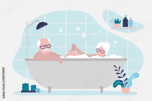 Elderly couple taking bubble bath together. Grandma and grandpa hold hands while bathing