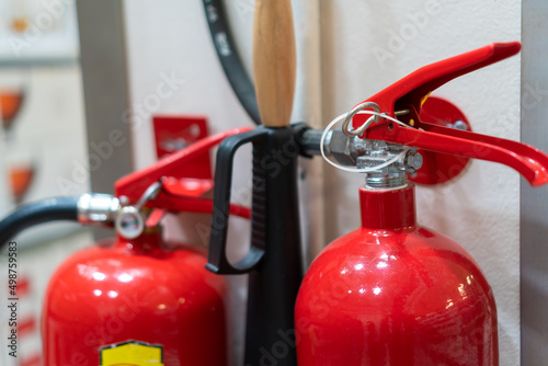 Close-up of a red fire extinguisher. Fire safety