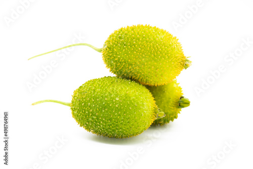 Selective focus, spiny gourd cut on white background photo