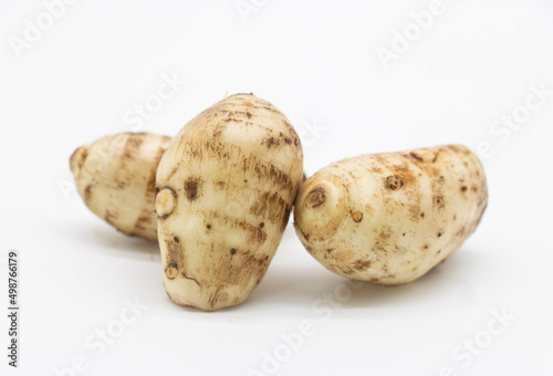 taro root or Arbi on white background, it's have full on calcium and iron