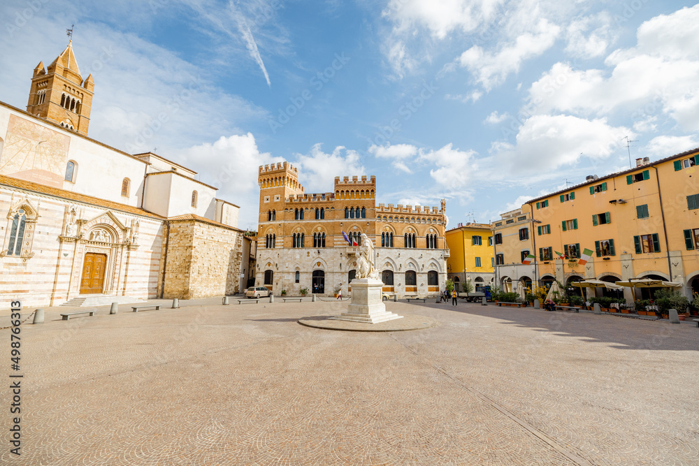 Morning view on Piazza Dante, central square in Grosseto town on sunny day. This city is the center of Maremma region at western central Italy