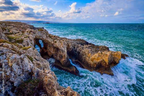 Fototapeta Naklejka Na Ścianę i Meble -  Beautiful landscape with a rocky sea shore on a sunny day