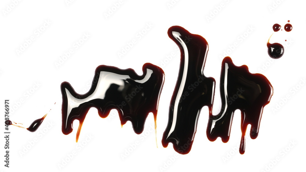 Spilled soy sauce, isolated on white, top view