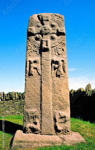 Celtic Pictish mediaeval Christian cross slab by the roadside near village of Aberlemno, Tayside, Scotland photo