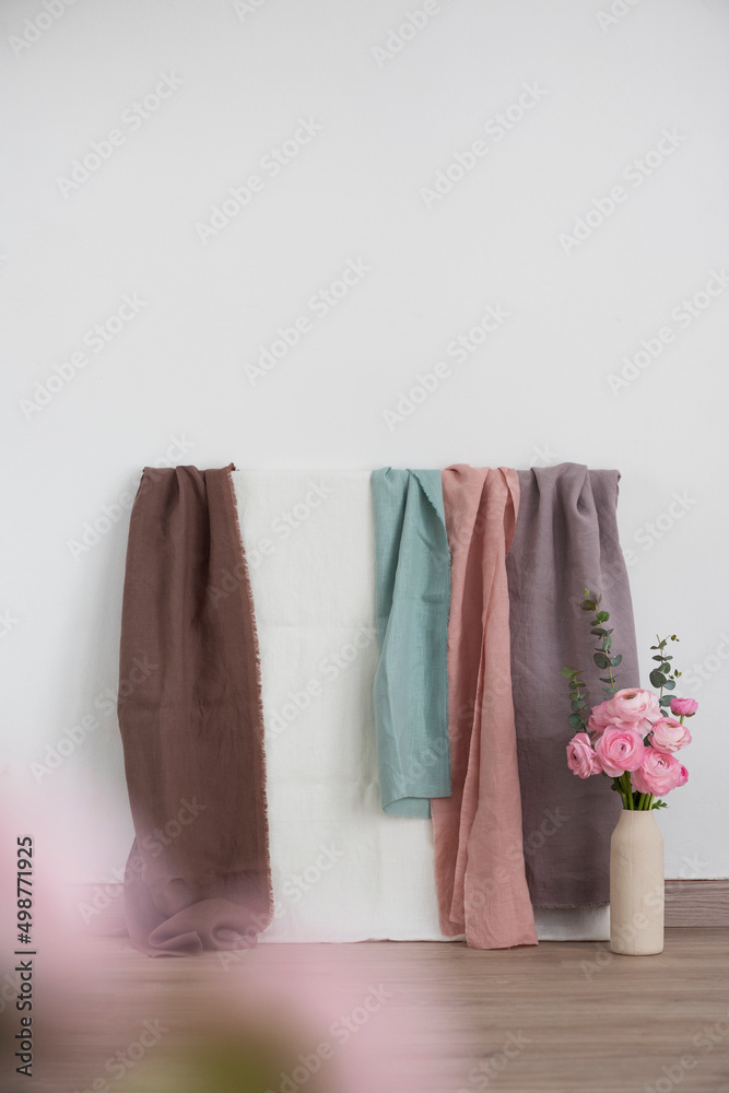 Fototapeta premium Sewing concept, linen colored fabrics