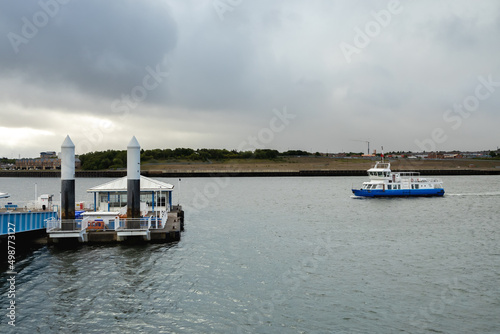 South Shields UK: 3rd June 2020: Metro Ferry on the River Tyne jetty photo