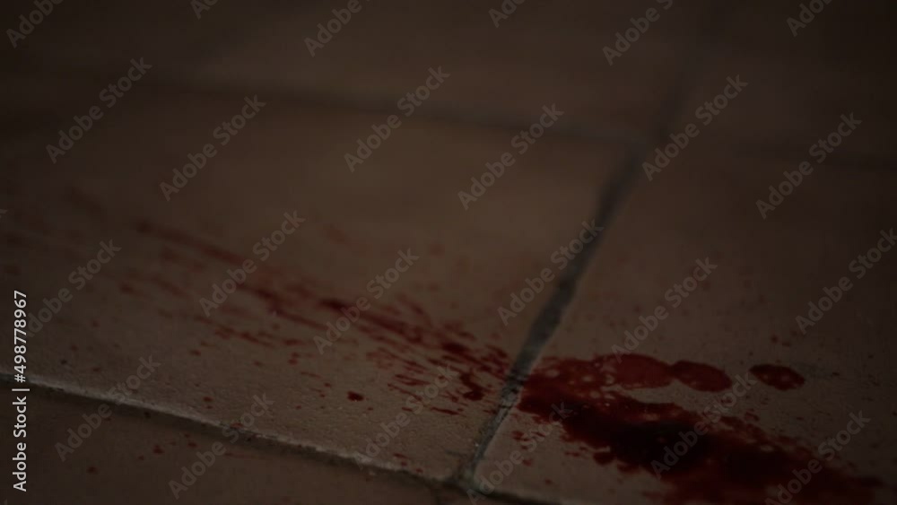 Blood Spray onto tiled floor