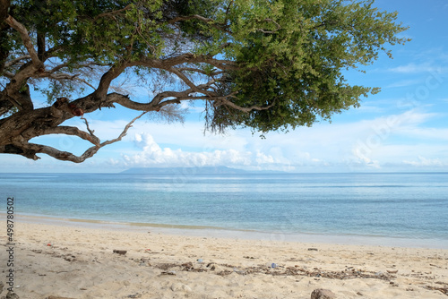Fototapeta Naklejka Na Ścianę i Meble -  Beautiful view of Cristo Rei Backside Beach or known as Dolok Oan Beach in Dili, Timor Leste. Beach background.