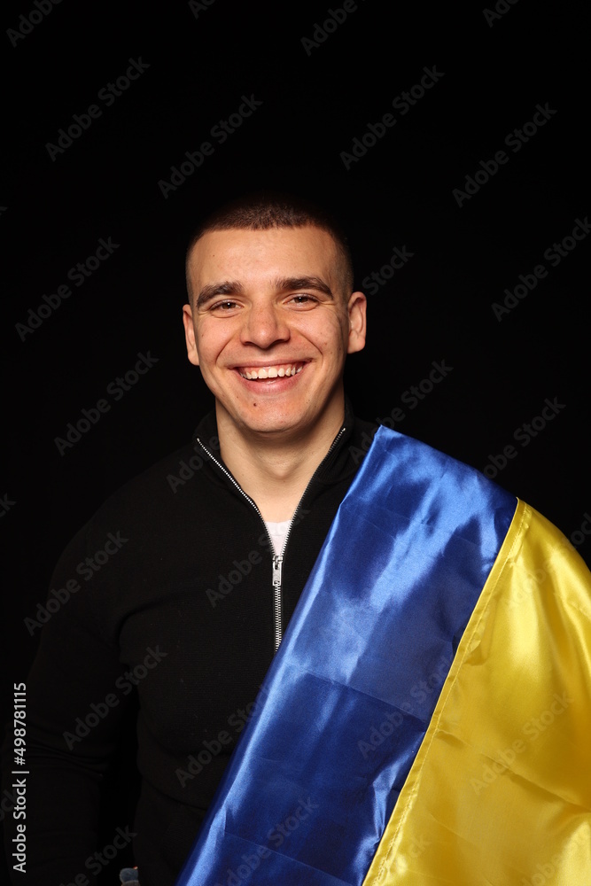 Ukraine flag on black background. war in Ukraine. patriot of his state. yellow and blue flag. Love your country. Victory Day in the war Ukraine flag on black background. war in Ukraine. patriot of his state. yellow and blue flag. Love your country. Victory Day in the war