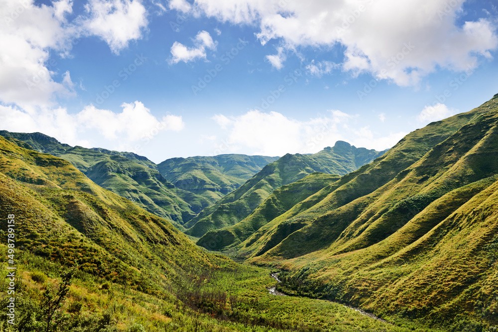 Obraz premium Be humbled by the majestic beauty of nature.... A picturesque view over green valleys and mountains.
