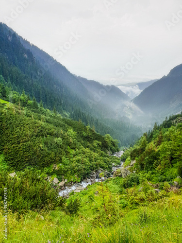 Mountain landscape river and fog in the valley