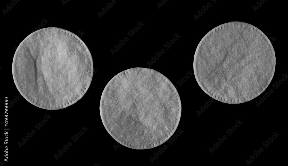 Obraz premium Cotton wool pads set and collection, absorbent wadding isolated on black background with clipping path, top view