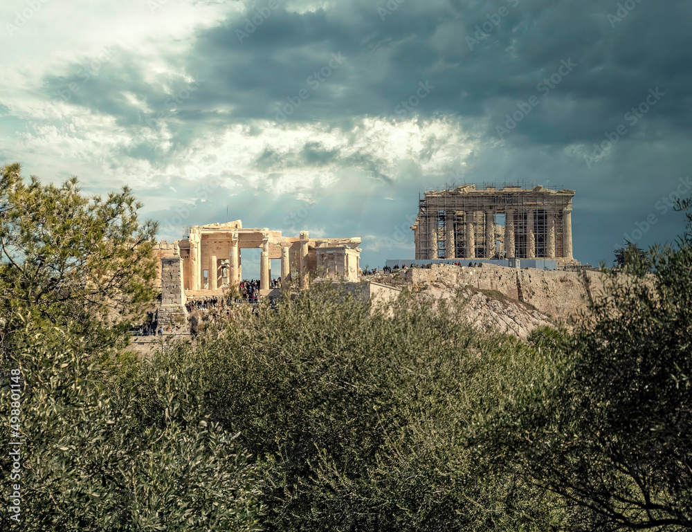 Parthenon ancient Greek on Acropolis of Athens, under dramatic cloudy sky