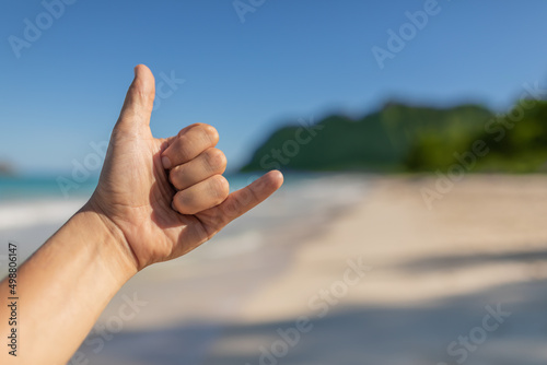 Shaka hang loose hand sign. Hawaii beach vacation. © kieferpix