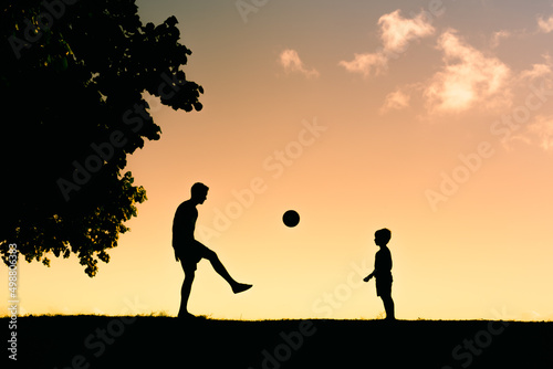 Father and son child playing together. Fatherhood, and family active lifestyle concept. 