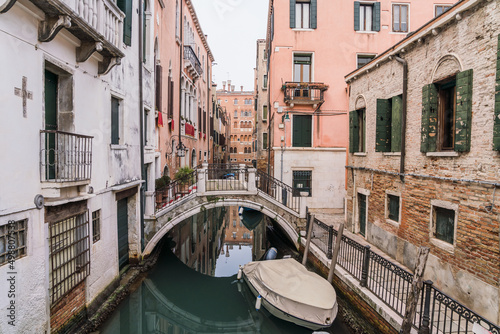 Beautiful antique street canal in Venice, Italy  © gammaphotostudio
