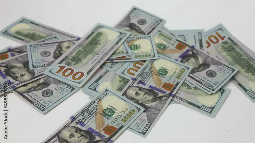 Dollar paper currency, banknotes falling. 100 bank notes Cash USA. Dollar paper currency, banknotes falling. 100 bank notes Cash USA.