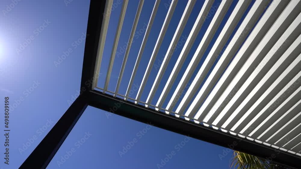 Trendy aluminum outdoor patio pergola. video of rotating blades
