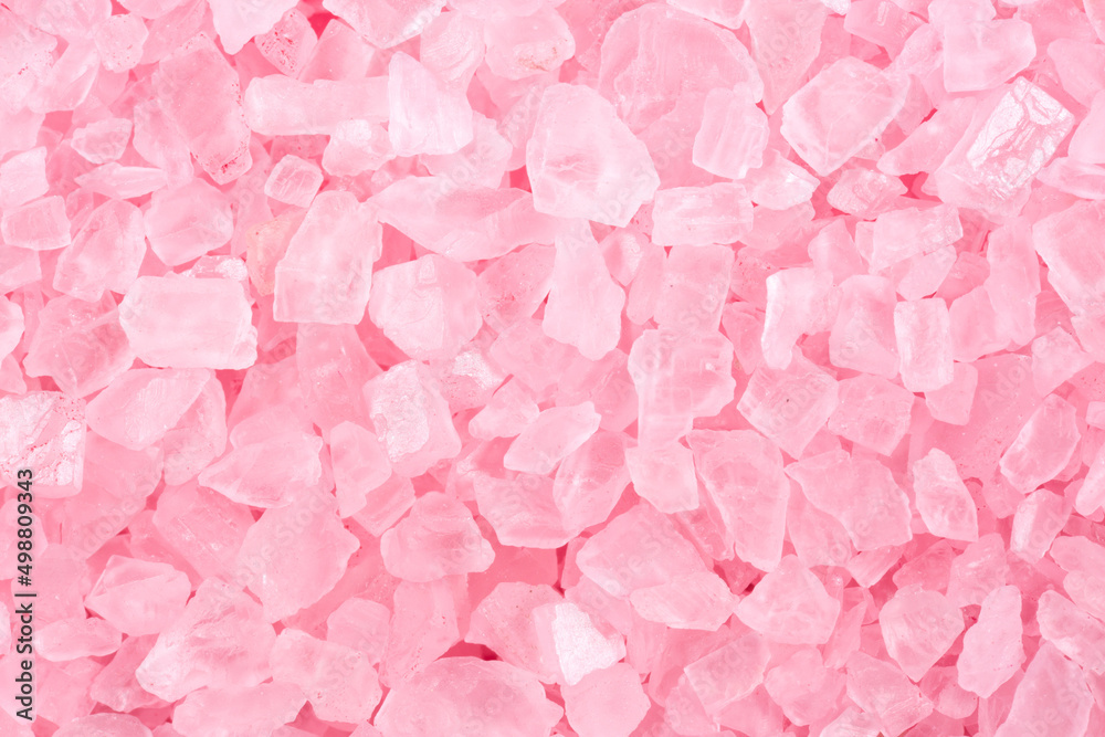 Fototapeta premium Salt crystals, sea salt as background and texture. Ice crystals pink