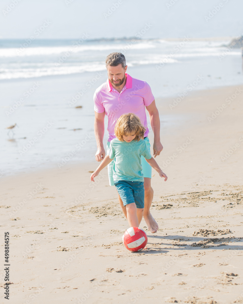 happy family of daddy man and child boy playing ball on beach, relationship happy family of daddy man and child boy playing ball on beach, relationship