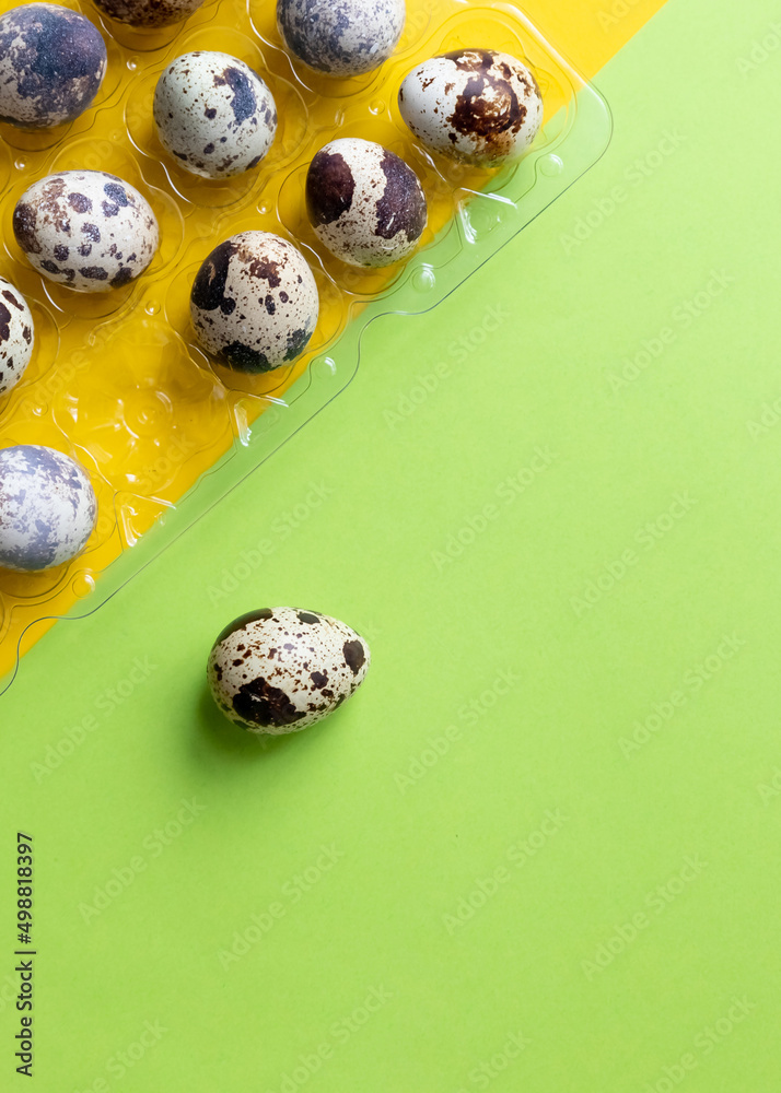 small spotted quail eggs.Quail eggs pattern. Happy easter concept. Minimal design. Copy space, flat lay, from above.spring still life, selective focus