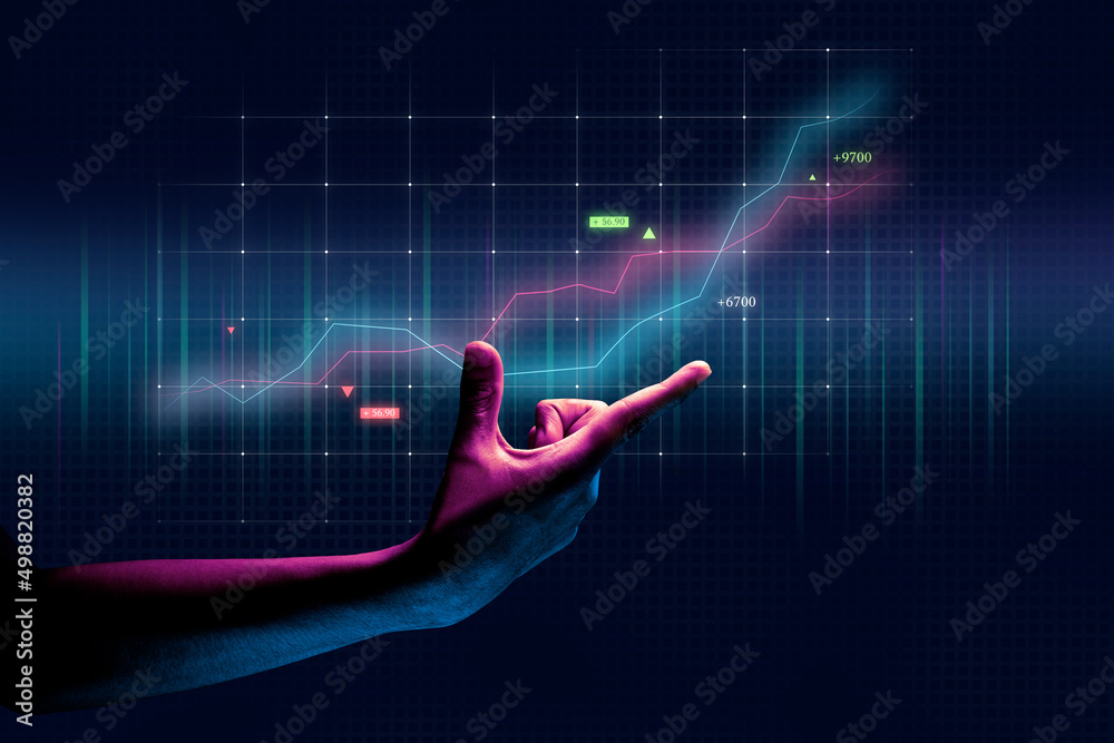 Businessman hand finance business chart of metaverse technology financial graph investment