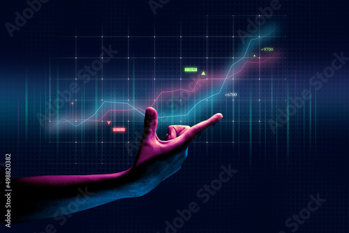 Businessman hand finance business chart of metaverse technology financial graph investment