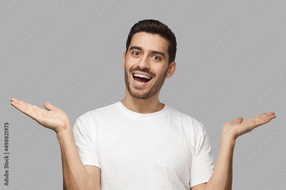 Surprised man being shocked to hear unexpected news, gesturing with both hands Surprised man being shocked to hear unexpected news, gesturing with both hands