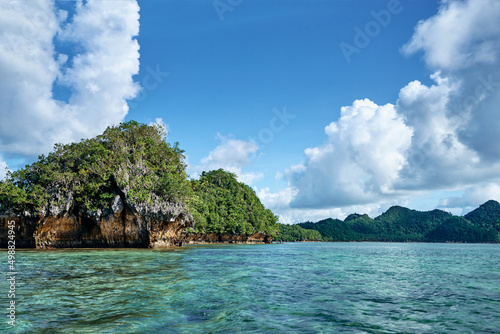 Fototapeta Naklejka Na Ścianę i Meble -  Beautiful landscape with blue sea lagoon and green cliffs, National Park, Siargao Island, Philippines.