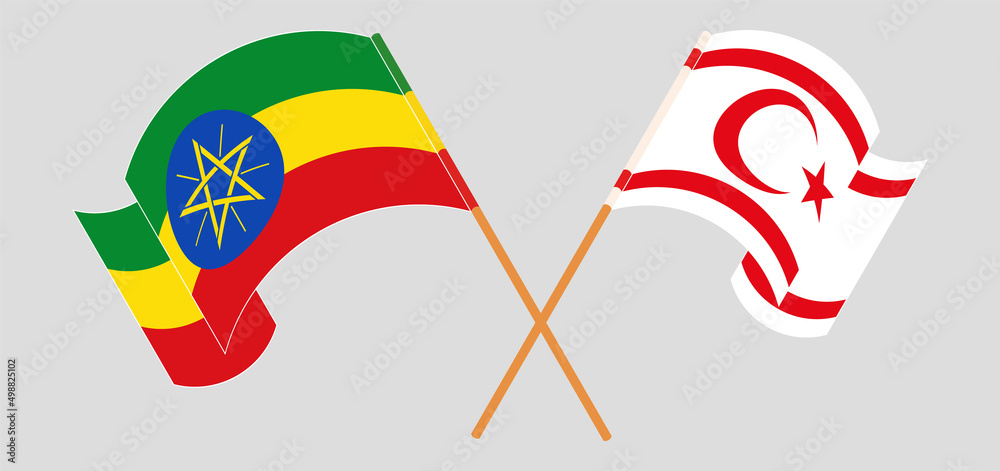 Crossed and waving flags of Ethiopia and Northern Cyprus