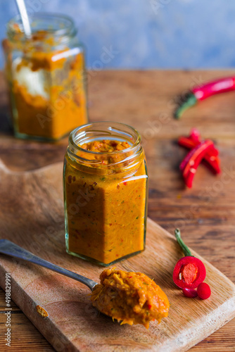 Jar of homemade Thai red curry paste