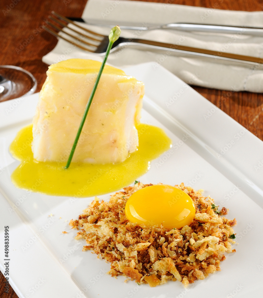 Cod with olive oill sauce, brioche farofa with olives and egg yolk Cod with olive oill sauce, brioche farofa with olives and egg yolk