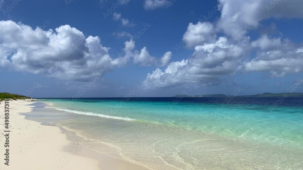 Sandy deserted tropical beach with turquoise sea. Motion of the camera. Sandy deserted tropical beach with turquoise sea. Motion of the camera.
