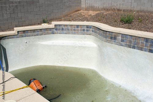 Residential Pool being drained and cleaned 