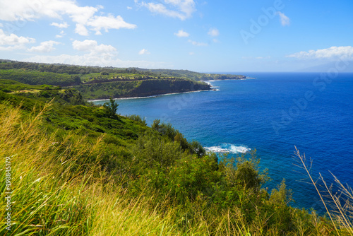 Honokohau Bay between the Kahekili and Honoapiilani highways on West Maui, Hawaii - Green cliffs above the Pacific Ocean photo