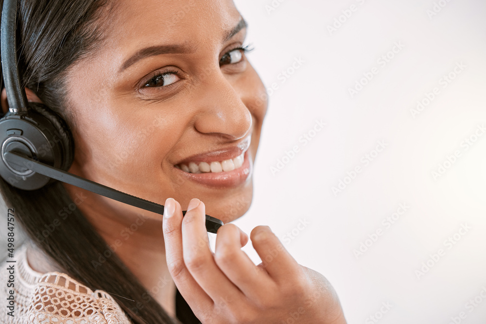 Ive got you. Cropped portrait of an attractive young female call center agent wearing a headset while working in the office. Ive got you. Cropped portrait of an attractive young female call center agent wearing a headset while working in the office.