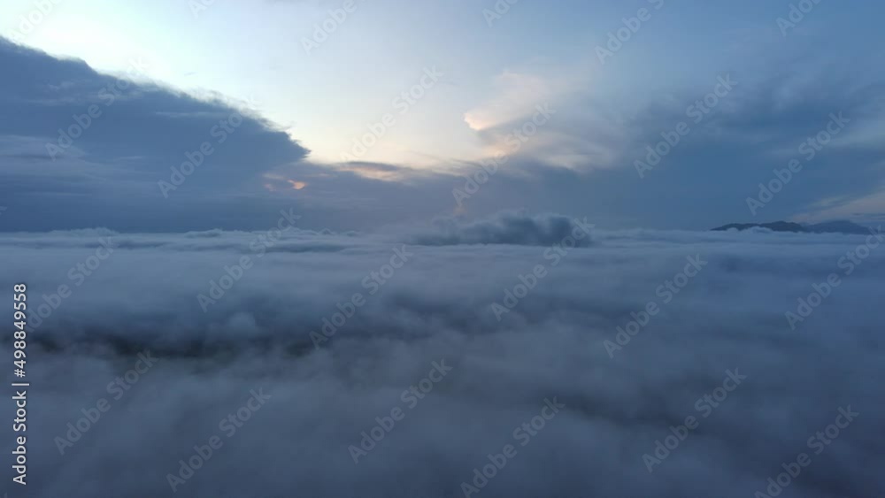 aerial view of smooth cloud flowing in the morning with sun light.concept for freedom,liberate, relieve, unchain aerial view of smooth cloud flowing in the morning with sun light.concept for freedom,liberate, relieve, unchain