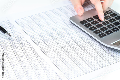 a person who is looking at financial statements in a company