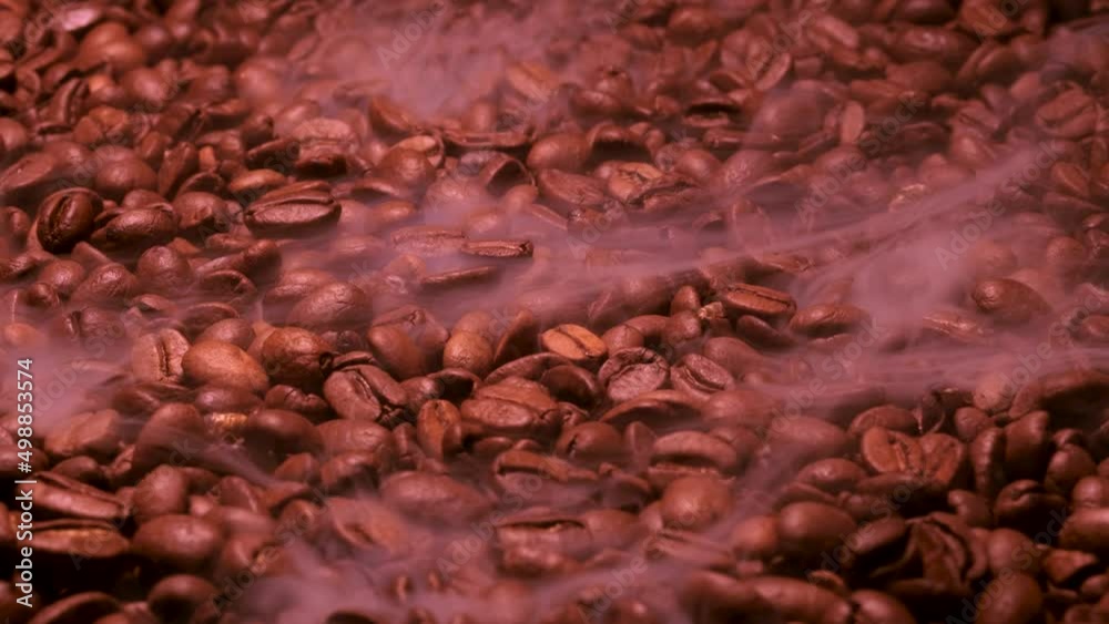 Aromatic smoke comes out from roasting coffee. Aromatic smoke comes out from roasting coffee.
