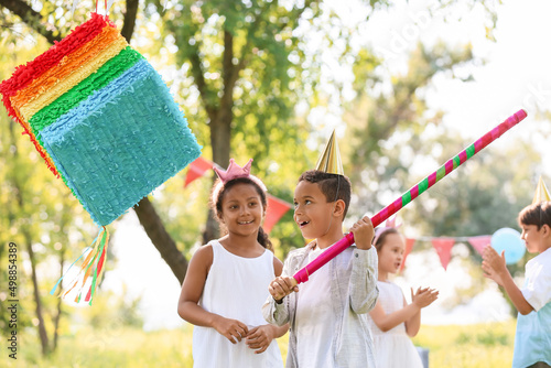 Cute children at pinata bir...