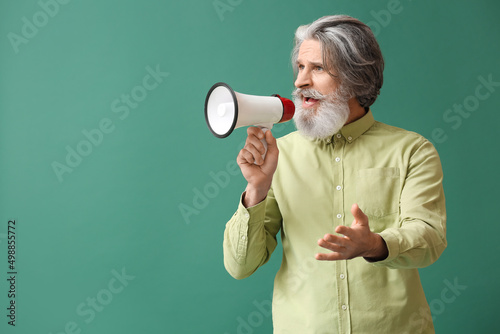 Senior man shouting into me...